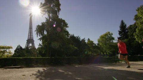 Couple Jogging with the eiffel tower in the background. Video stock 63022958