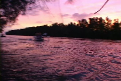 Couple Kayaking Upstream Stock Footage 141066