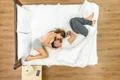 The couple kiss in the bed. View from above Photo
