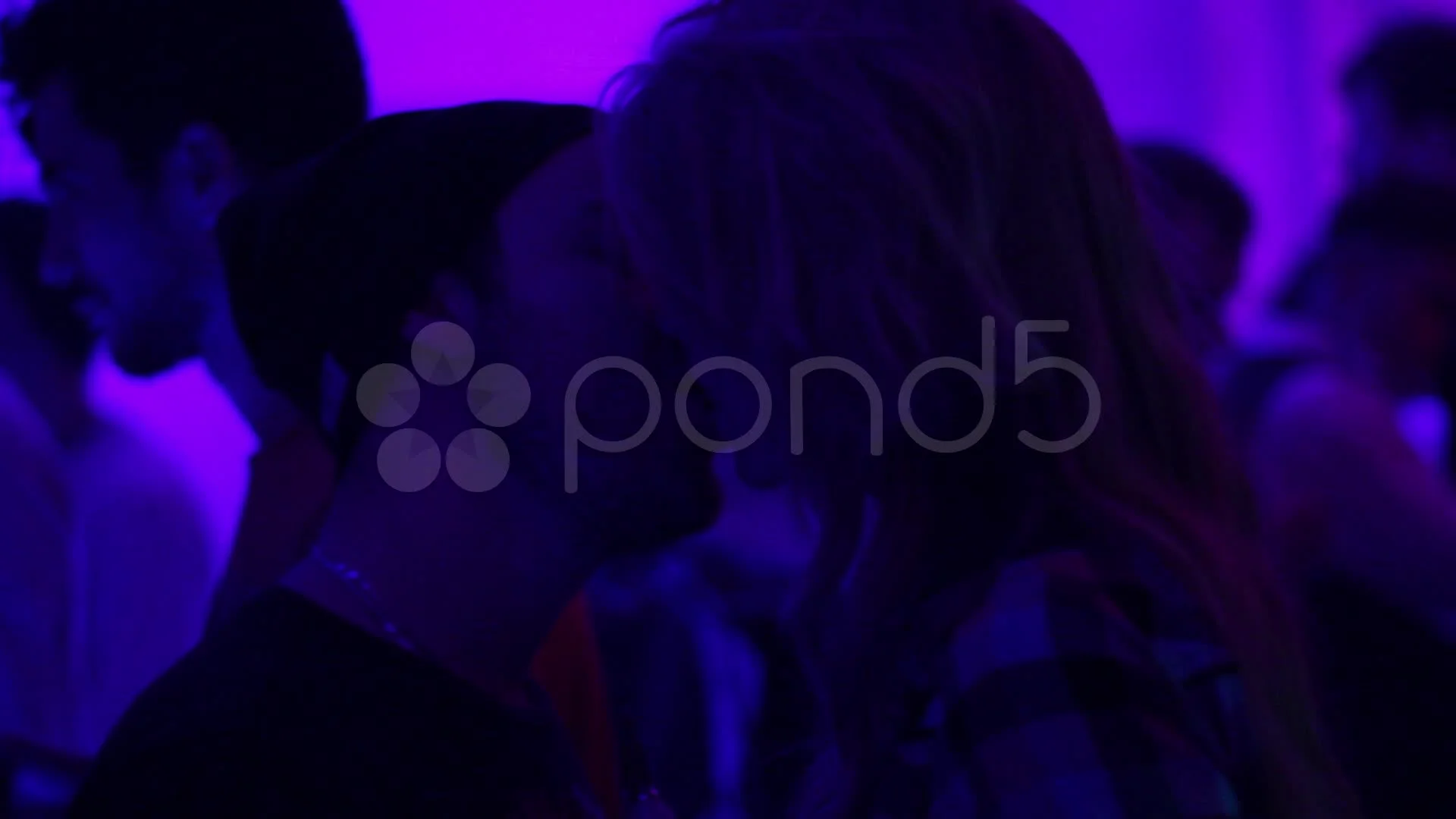 Couple is kissing in night club. Man and... | Stock Video | Pond5