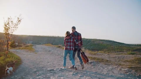 Couple kissing while walking  Stock Footage 75257800