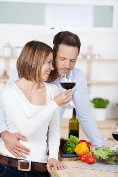 Couple in kitchen Stock Photos