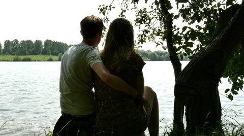 Couple at lakeside 4k Stock Footage 41021315
