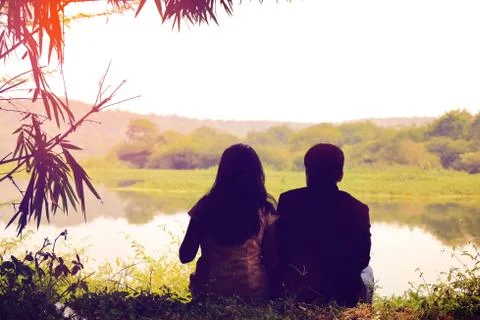 Couple on the lakeside Stock Photos