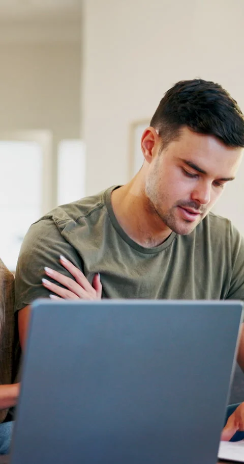 Couple, laptop and discussion with documents for finance, bills and planning Stock Footage 336848728