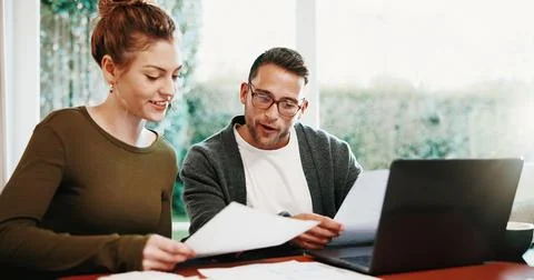 Couple, laptop or discussion with documents for finance, investment or audit Stock-Fotos