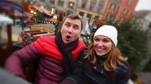 Couple Laughing and Having Fun in the Christmas Fair. Friends During Winter Stock Footage 70129780