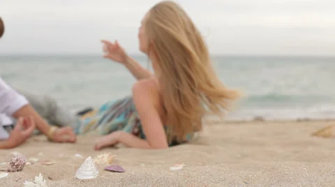 Couple Laying On The Beach Stock-Footage 26175189