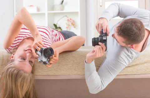 Couple laying on the bed Stock Photos