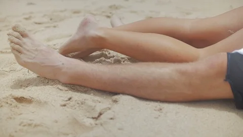 Couple Laying on the Sand Stock-Footage 90543790