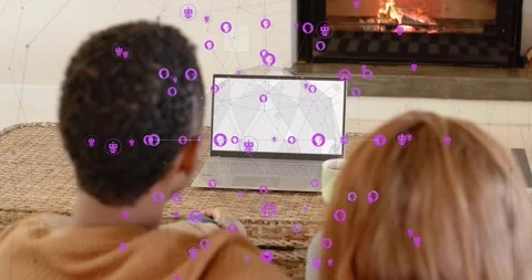 Couple leaning over laptop graph, man touching touchpad purple icons floating Stock Footage 319491542