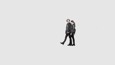 A couple in leather jackets walk together holding hands Stock Footage 167705077