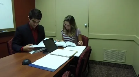Couple in a library together Stock Footage 52046644