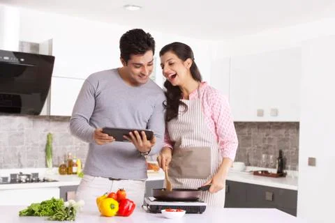 Couple looking at a digital tablet Foto stock