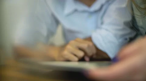 Couple looking at digital tablet together Stock Footage 63305448