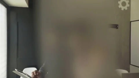 Couple looking at digital tablet together Stock Footage 75172192