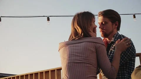Couple looking at each other during sunset Stock Footage 168840994