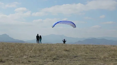 Couple looking at the glider Stock Footage 68540130