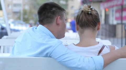 Couple looking at menus in a restaurant Stock Footage 66782028