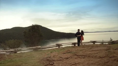 Couple looking into ocean scene. Stock Footage 48589546