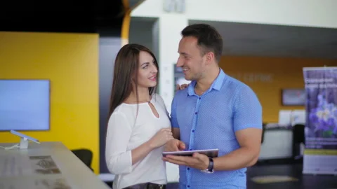 Couple is looking smth in the tablet. Stock Footage 92662268