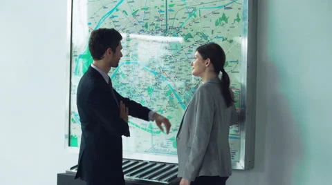 Couple looking at subway map making travel plans Stock Footage 63296968