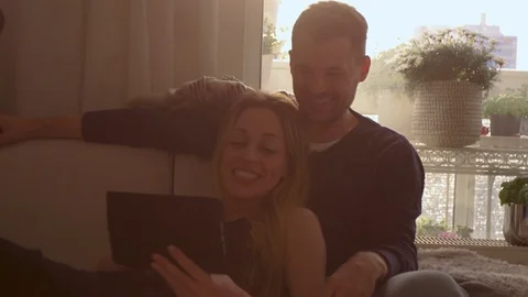 Couple looking at a Tablet  Stock Footage 111256385