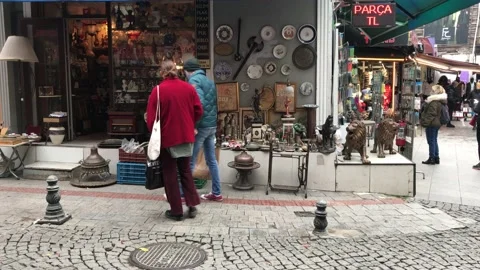Couple looking at things in antique shop Stock Footage 145220596