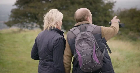 Couple looking through binoculars Stock-Footage 59899660