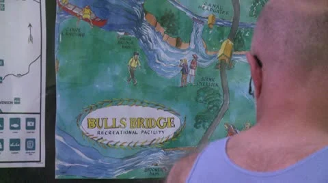 A couple looking at a trail map for Bulls Bridge Recreational Facility (2 of 2) Video stock 10772606