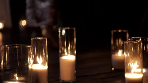Couple in love dancing during a romantic candlelight dinner Stock Footage 235889010