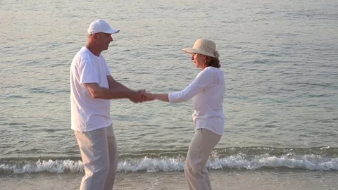 Couple in love dancing on the sandy beach Stock Footage 78081635