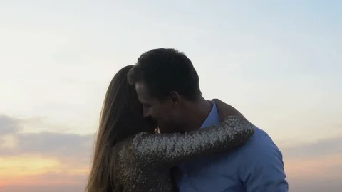 Couple in love dancing together under beautiful evening sky, magic hour, date 動画素材 117194989
