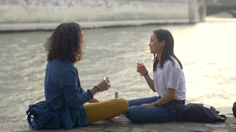 Couple in love drinking wine by the river Stock Footage 118891700