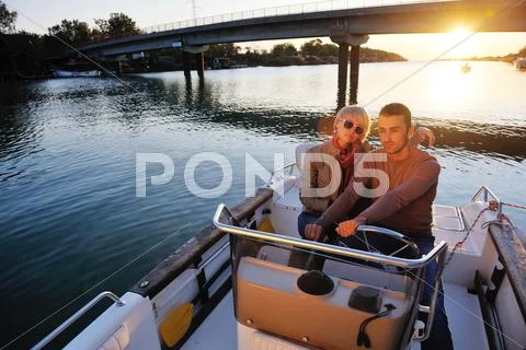 Couple in love have romantic time on boat Stock Photos