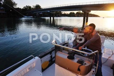 Couple in love have romantic time on boat Stock Photos