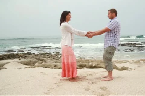 Couple in love having fun on the beach Видео 10839904