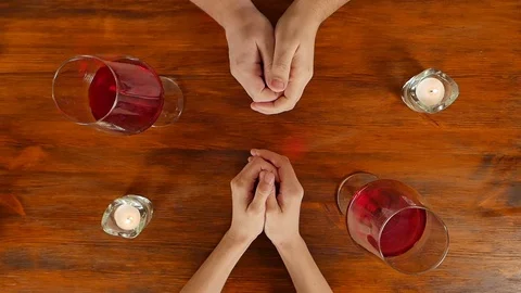 Couple in love holding hands in a cafe, top view Stock Footage 70802425