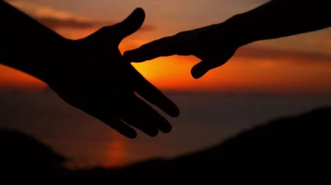 Couple in Love Holding Hands at Sunset. Slow Motion. Stock Footage