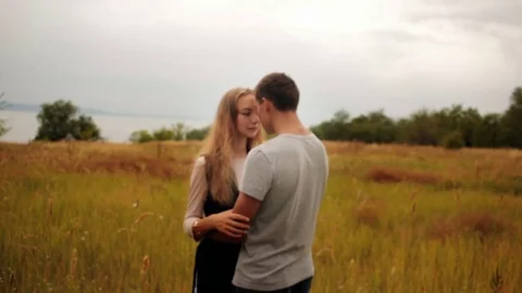 Couple in love looking at each other on outdoor Stock Footage