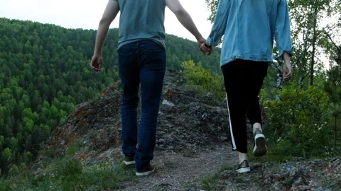 Couple in love on the mountain path. Stock Footage 111094114