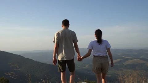 A couple in love in the mountains Stock Footage 231784633