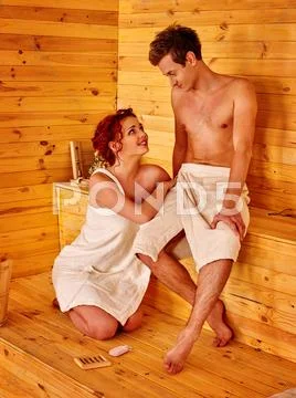 Couple in love relaxing at sauna. Stock Photos