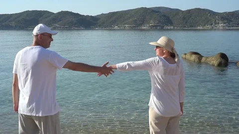 Couple in love on the sandy beach Stock Footage 78074690