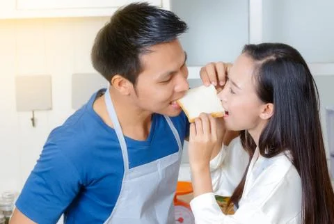 Couple in Love sharing a slice of bread Stock Photos