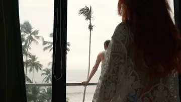 Couple of lovers admire the ocean view on the terrace Stock Footage 85912337