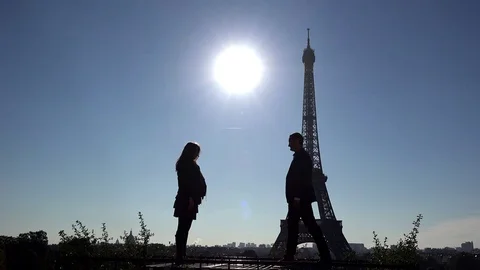 Couple lovers embrace in front of Eiffel tour Paris Stock-Footage 70004047