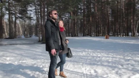 Couple lovers in forest admire the view of nature. Moving away shot Stock Footage 76555720