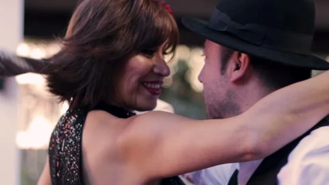 A couple of lovers, formally dressed, dancing the cueca brava Stock Footage 337015552