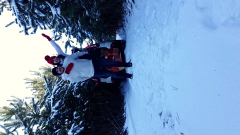 Couple lovers having date in snowed forest Stock Footage 151642491